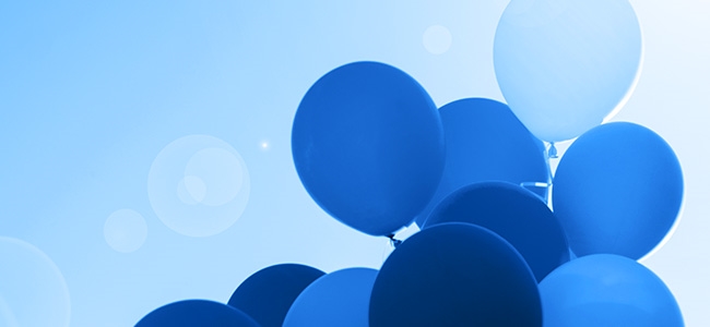 Blue balloons with a blue sky background