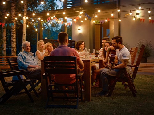 Family enjoying dinner outside