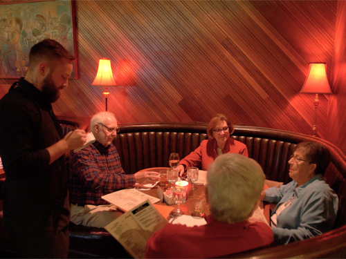 Guests dining in a Supper Club