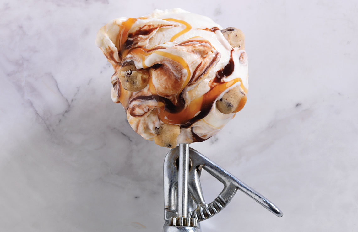 Single scoop of 'Caramel Fudge Cookie Dough' Fresh Frozen Custard.