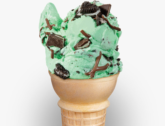 Oreo cookie pieces, Andes chocolate chunks and strings of hardening chocolate are served in a cake cone