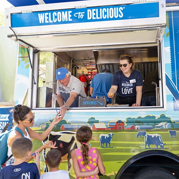 Co-founder Craig Culver and team members serving guests.