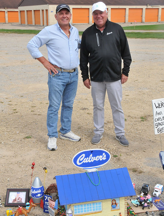 Dana Terrian and Craig Culver stand near the toy car line at Little Culver’s in Oregon, Wisconsin   