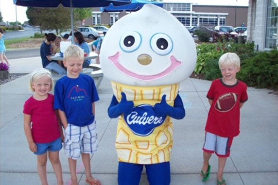 The young Kuehl siblings pose with an old-school Scoopie outside of the Culver’s restaurant. 