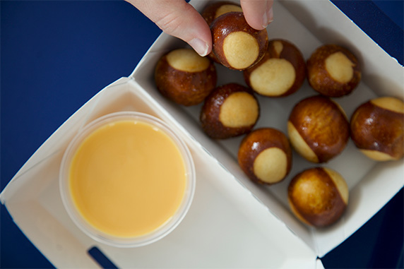 Pretzel Bites and Wisconsin Cheese Sauce in a to-go box