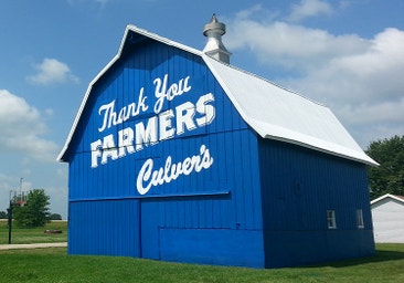 “Thank You Farmers” message painted on the side of Culver’s Blue Barn in Argenta, Illinois. 