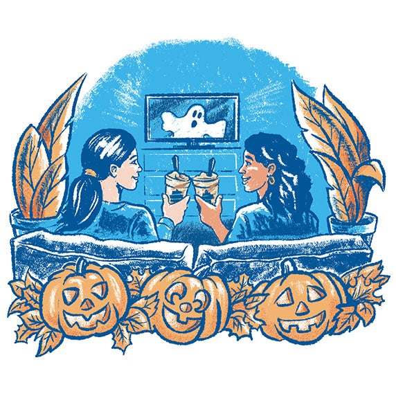 Two people enjoying Salted Caramel Pumpkin Concrete Mixers while watching a spooky movie.