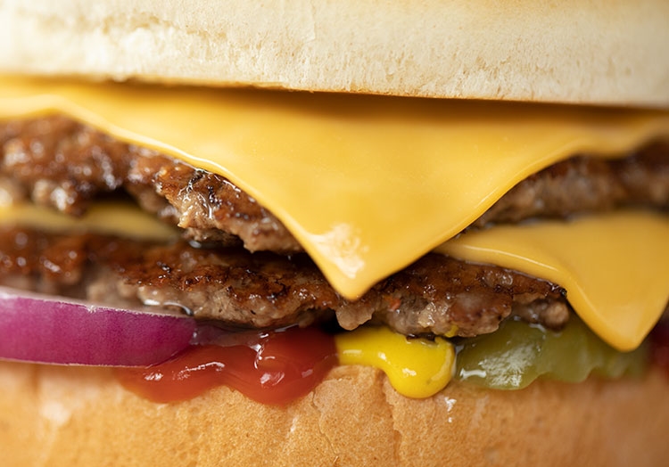 Link to story: Cooked to Order ButterBurgers made just how you like them. Close-up view of Culver’s ButterBurger Cheese. 