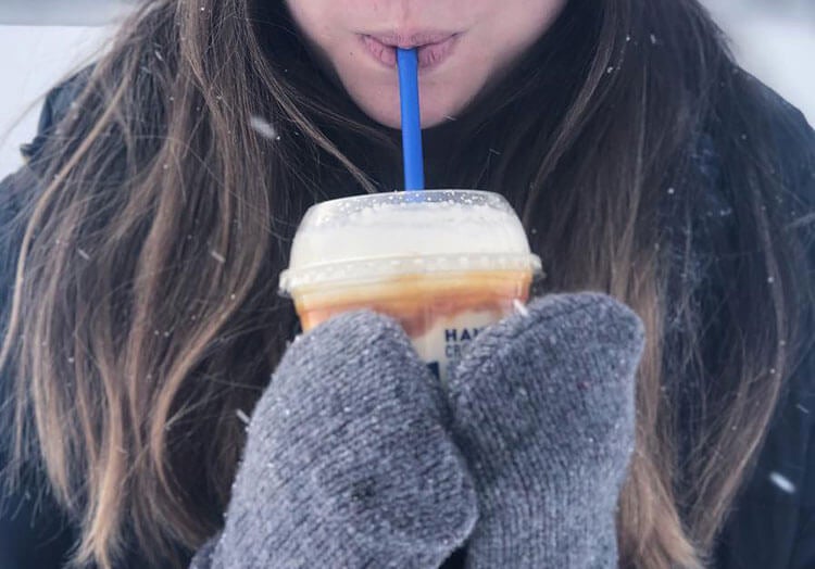 Link to story: It's Never Too Cold for Fresh Frozen Custard. Guest gloved hand holding a Concrete Mixer.
